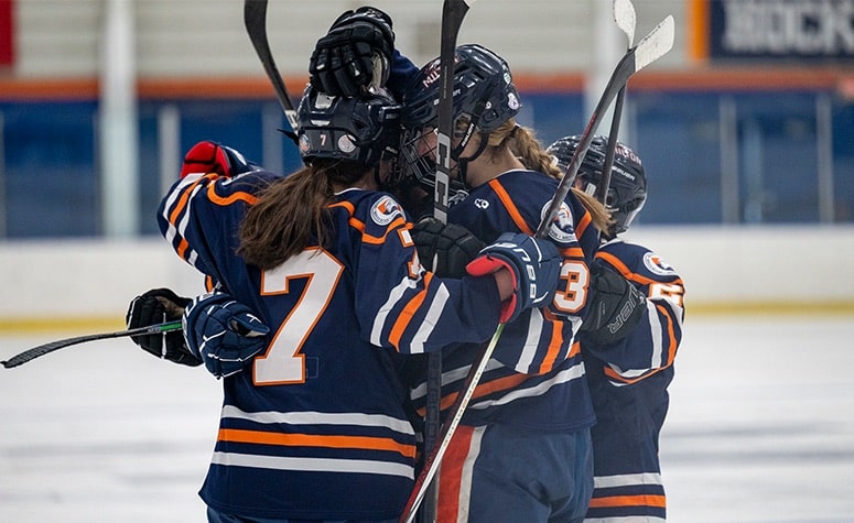 Milton girls hockey celebrates