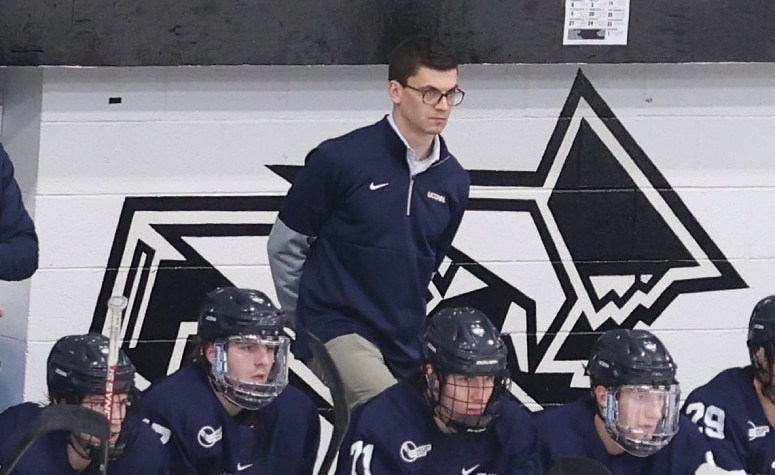 Mike Pereira behind the bench