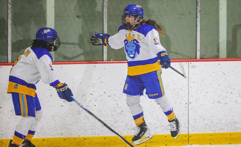 Aubryn Monter (11) celebrates her goal in the finals. (Brian Kelly/NEHJ)